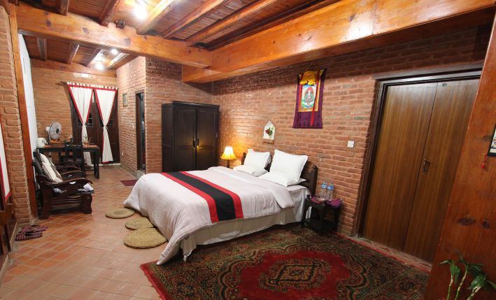 Heritage Deluxe room with Newari rug