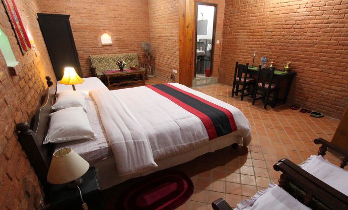Heritage Deluxe room bed